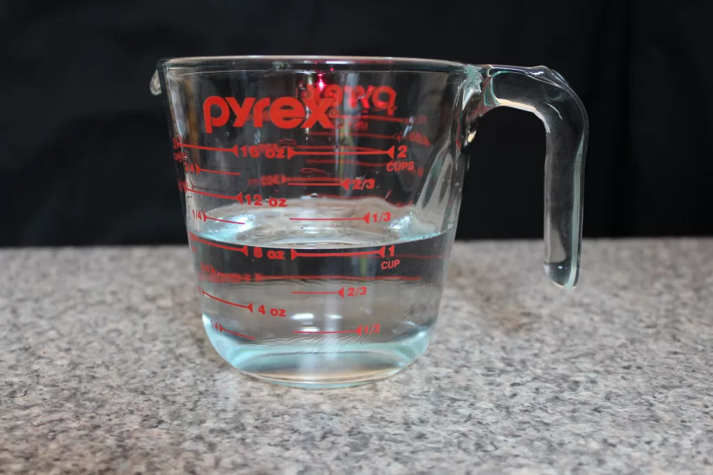 measuring cup with water