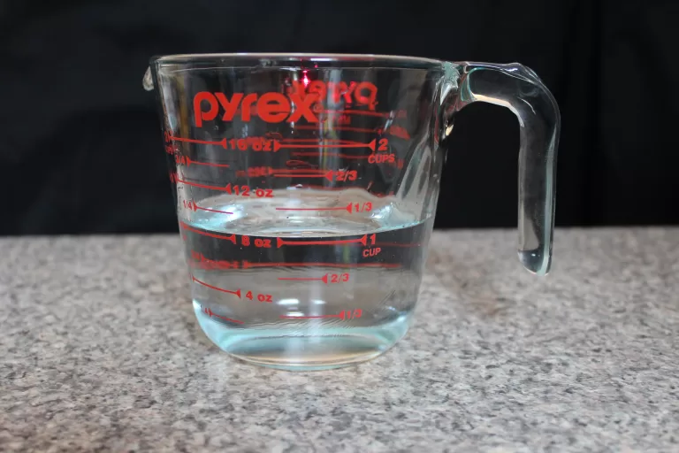 measuring cup with water
